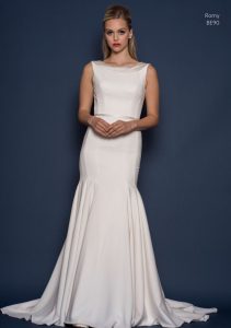 Fitted and fishtail wedding dress by Louise Bentley bridal