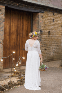 Bohemian wedding dress with open V-back and loose skirt