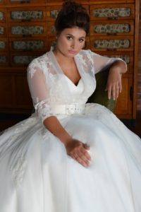 Curvy sleeved Lois Wild wedding dress in Stratford-Upon-Avon