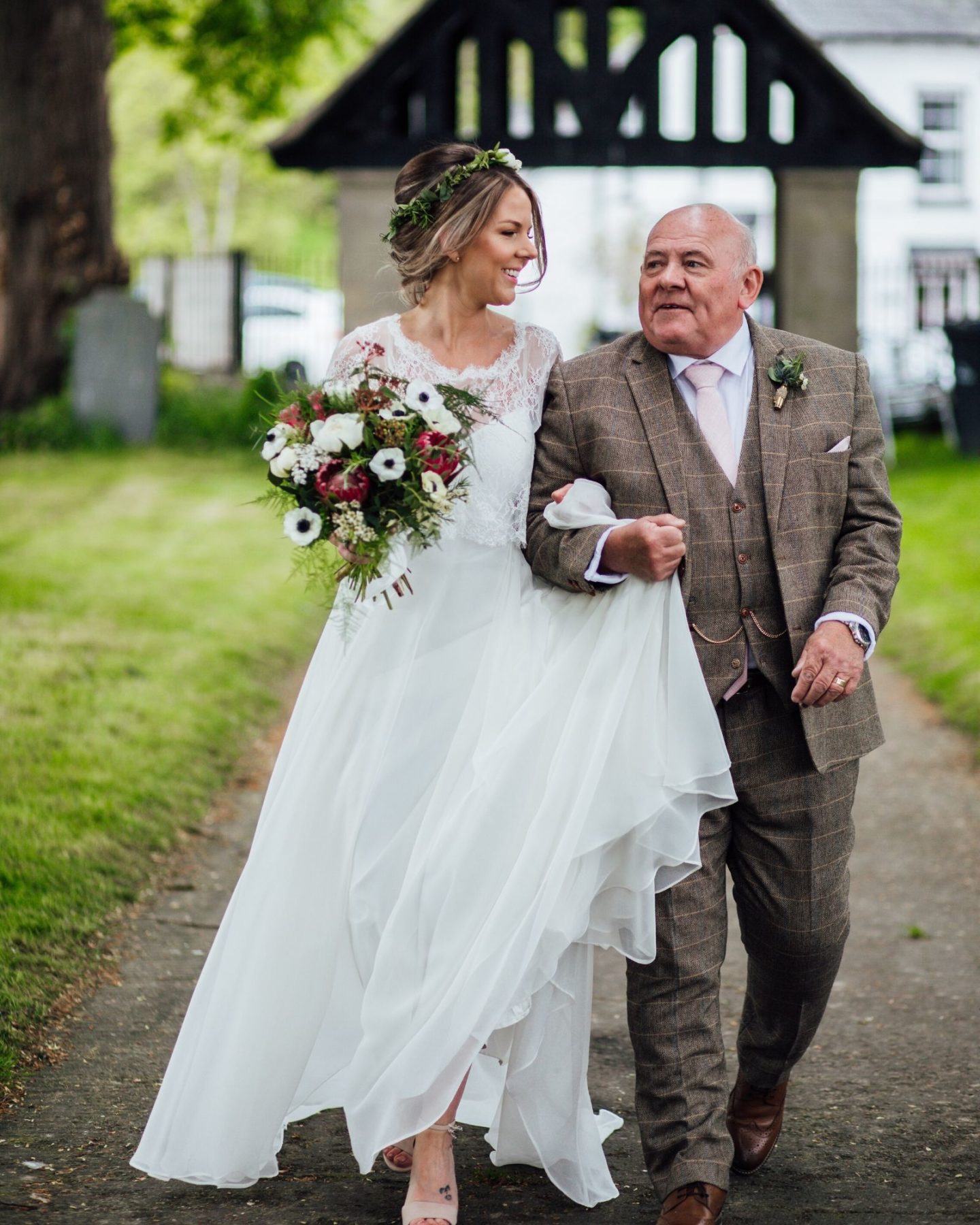 Bride wearing Aldo shoes and bespoke wedding dress boho bride