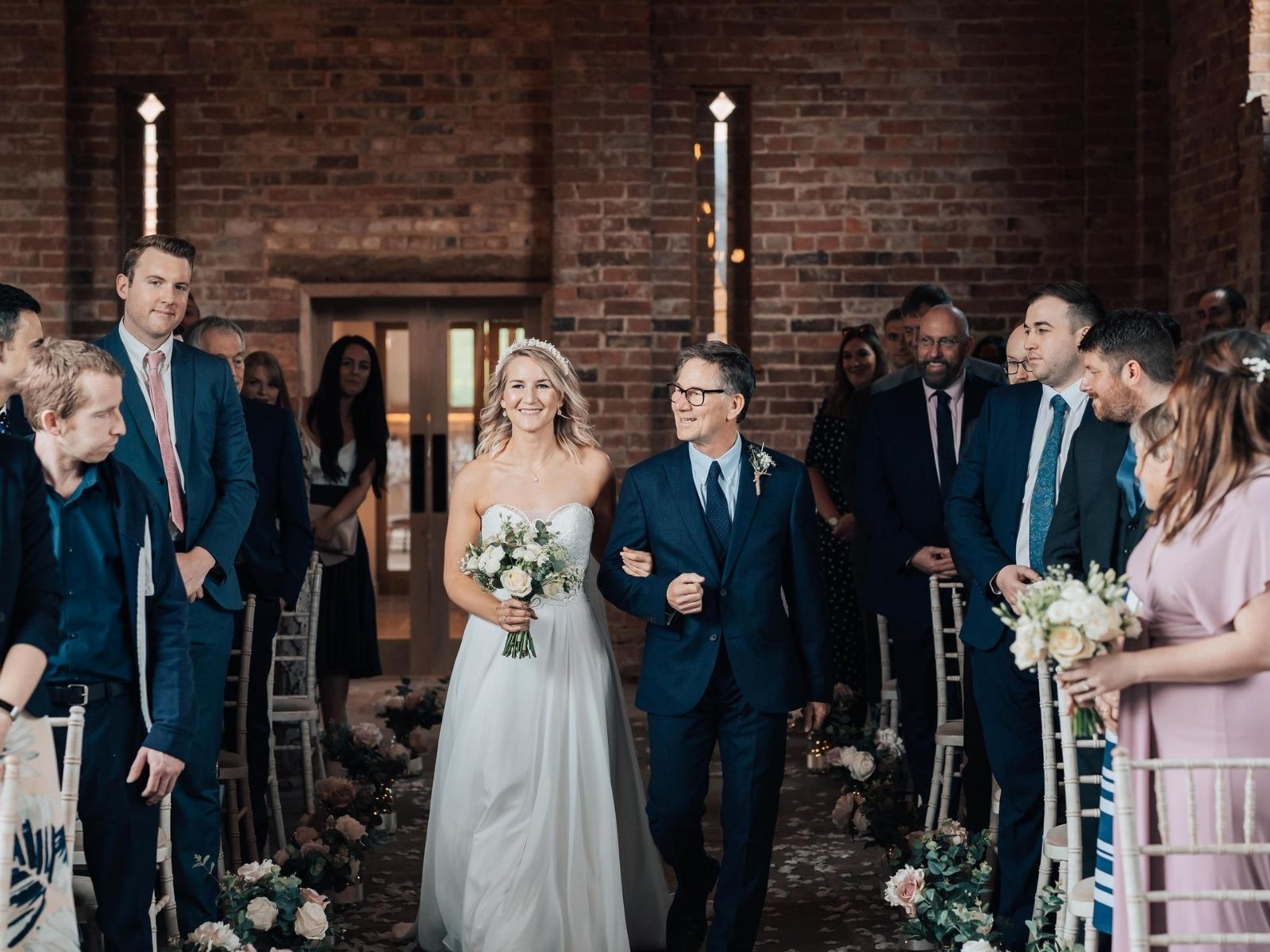 Bride wearing Millie May wedding dress from Boho Bride Boutique, Stratford bridal shop, at wedding ceremony at Mickleton Hills Farm wedding venue in Chipping Campden