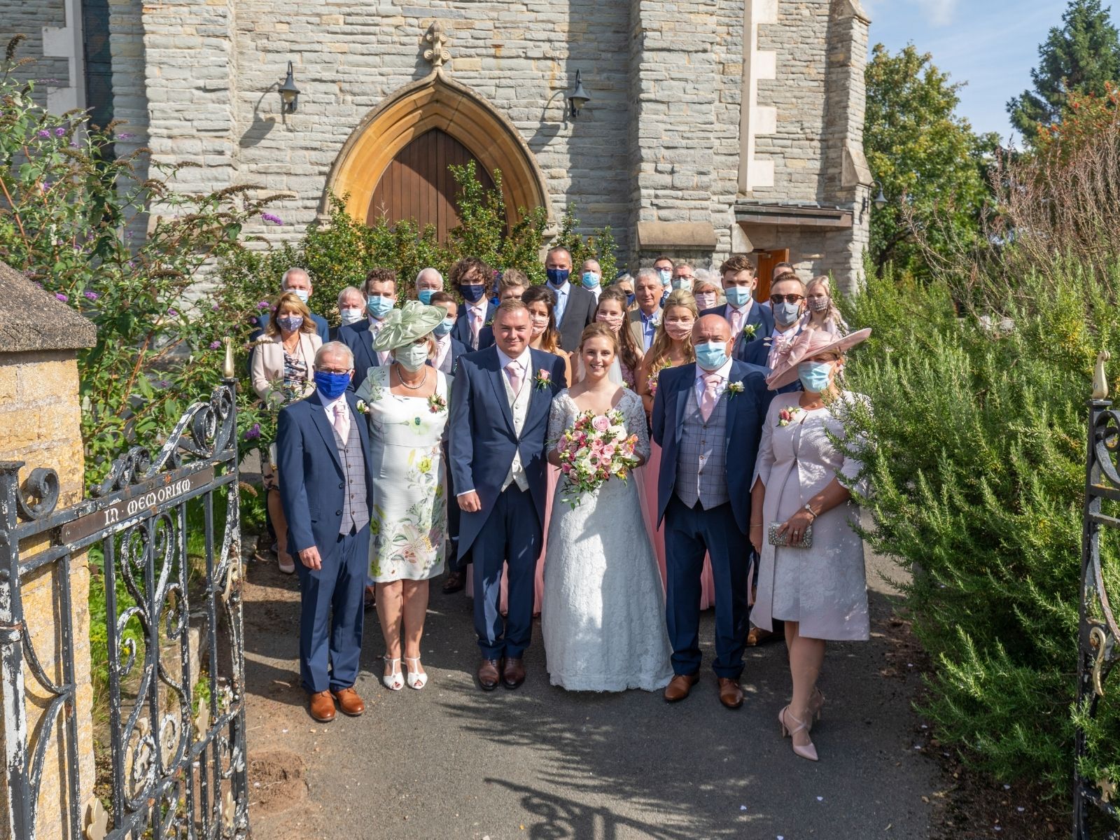 Rachel and Shaun's wedding guests outside the church