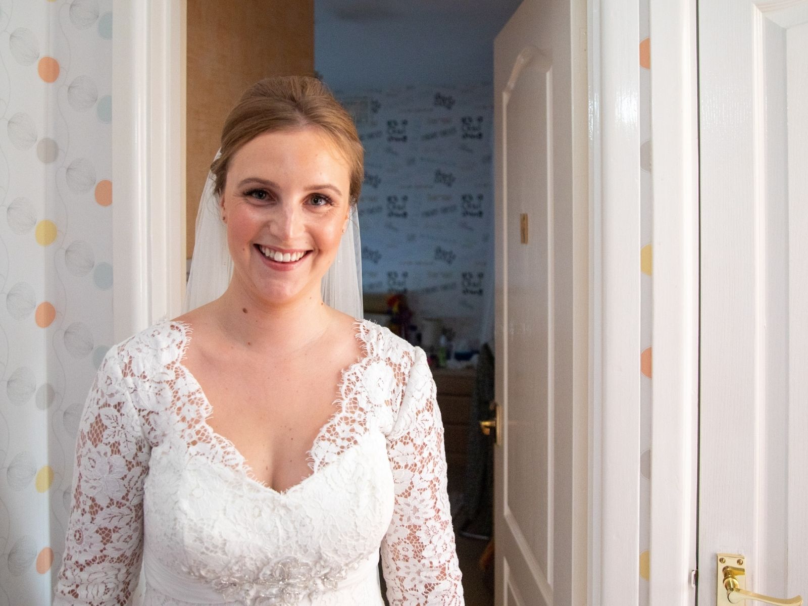 Mid-close shot of Rachel in her Millie May wedding dress